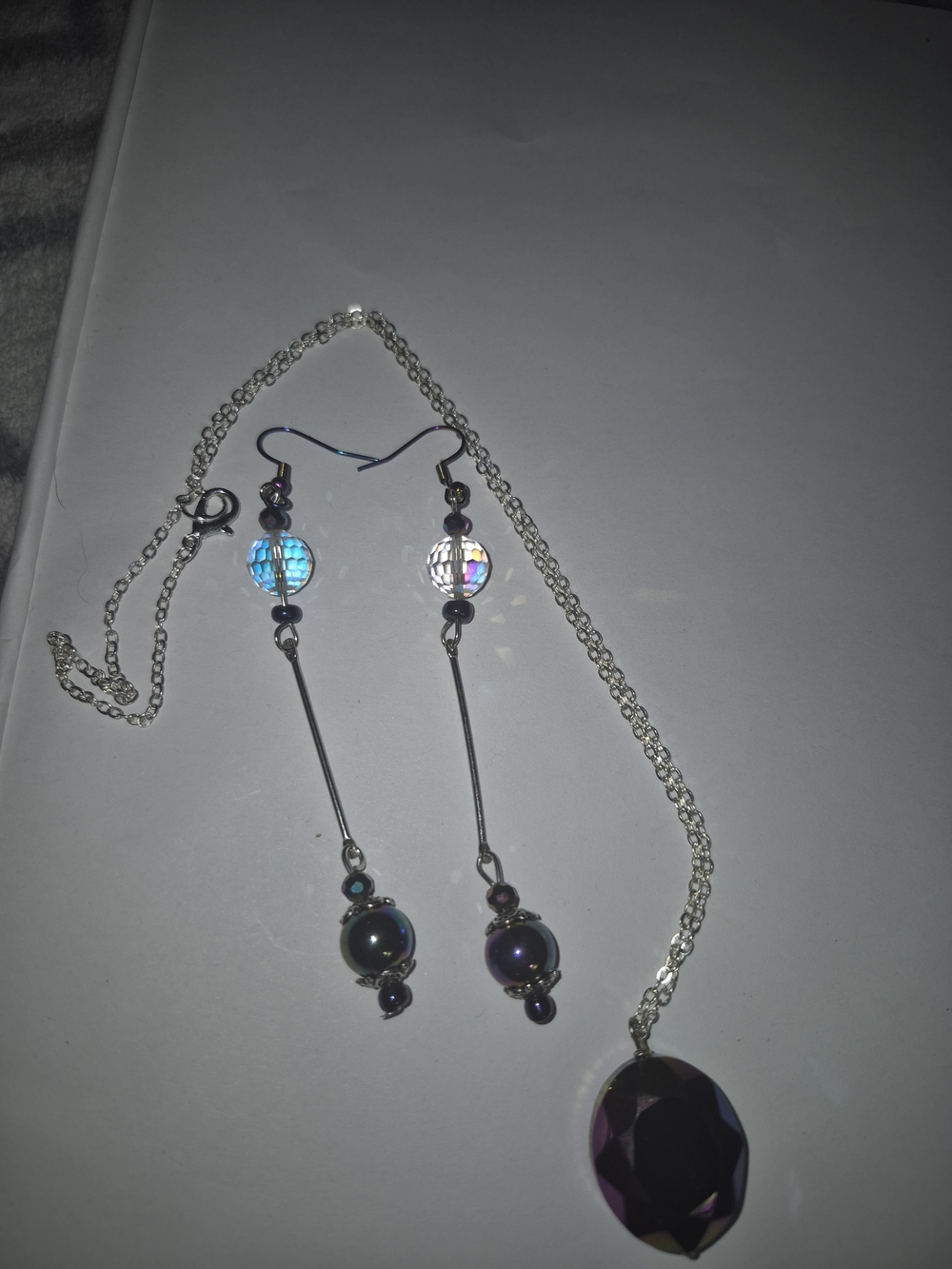 Silver-Tone Necklace with Purple Faceted Pendant and Matching Drop Earrings